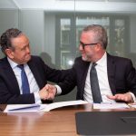 Firma acuerdo Andersen y 1MillionBot